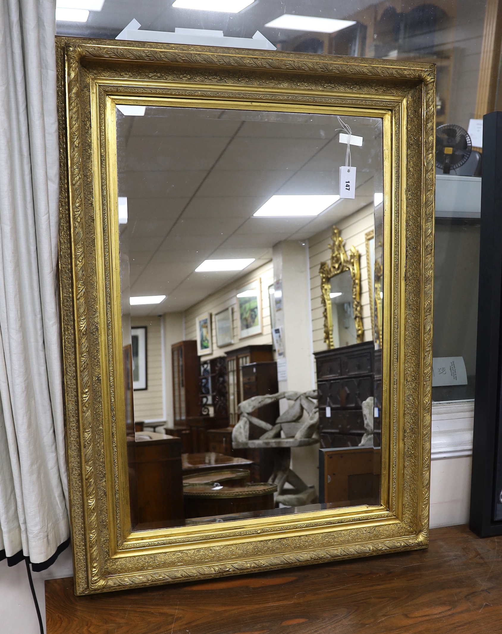 A Victorian style rectangular gilt frame wall mirror, width 84cm, height 114cm